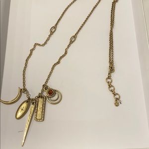 Fossil necklace gold with charms